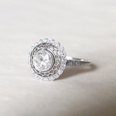 Art Deco 0.71 Carat Transitional Cut Diamond Filigree Halo Ring