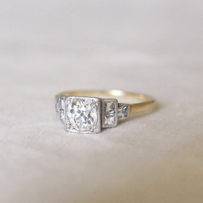 Art Deco 0.75 Carat Old Mine Cut Diamond with French Cut Diamond Stepped Shoulders